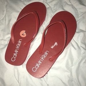calvin klein flip flops red
